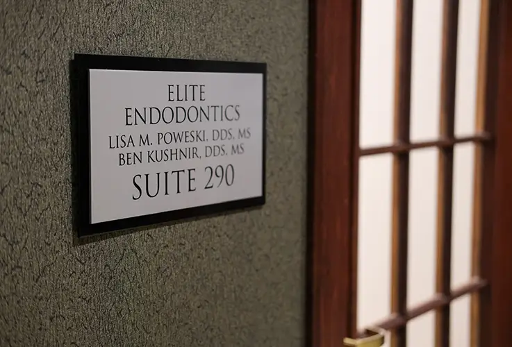 Elite Endodontics sign and hallway